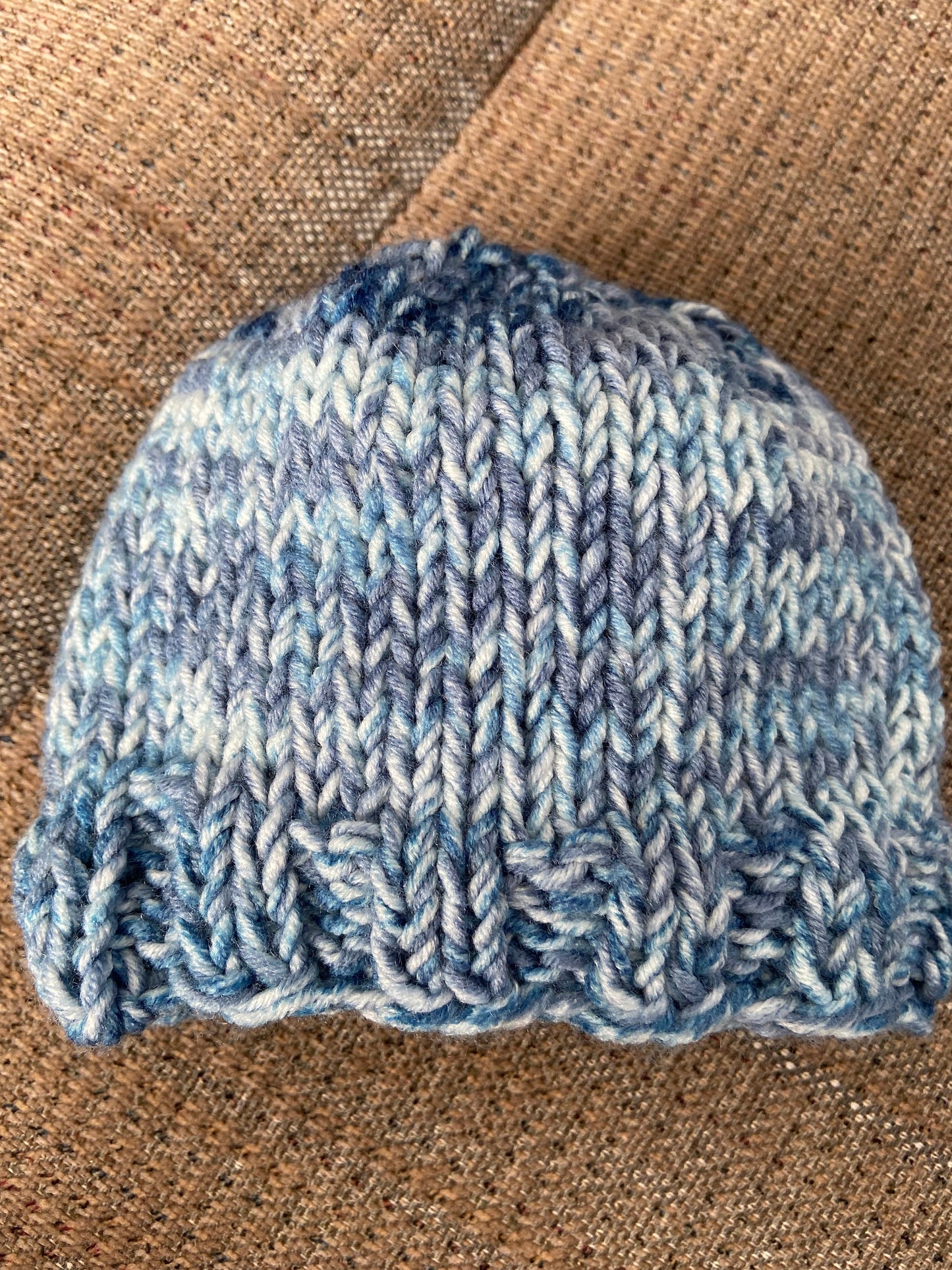 Hand knit baby hat in Ombre yarn for uniqueness