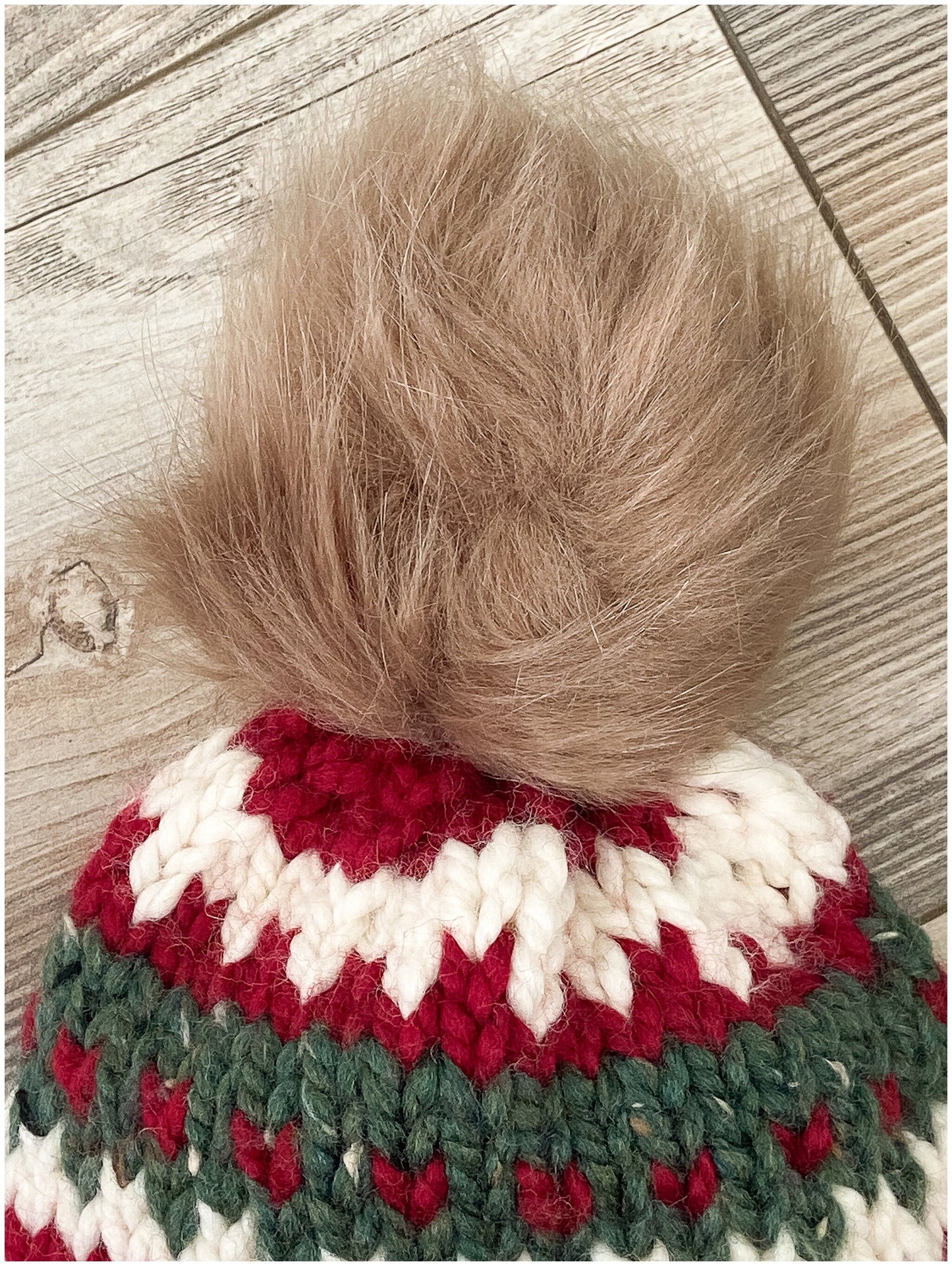 Women's Christmas hat knit in classic fair isle pattern with faux fur pom-pom