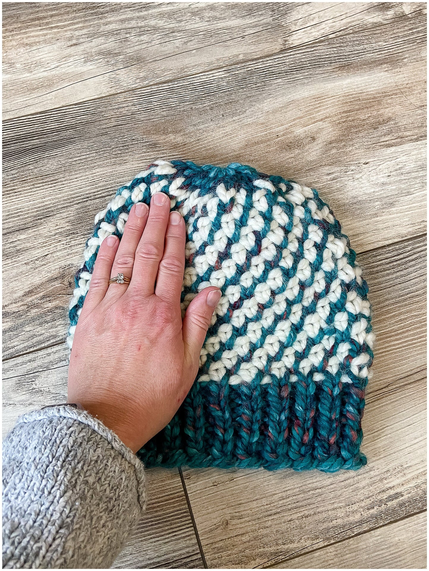 Kaleidoscope hat, beautiful cream and variegated teal wool hat