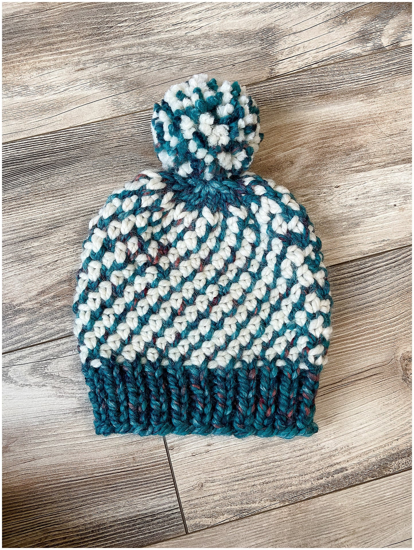 Kaleidoscope hat, beautiful cream and variegated teal wool hat