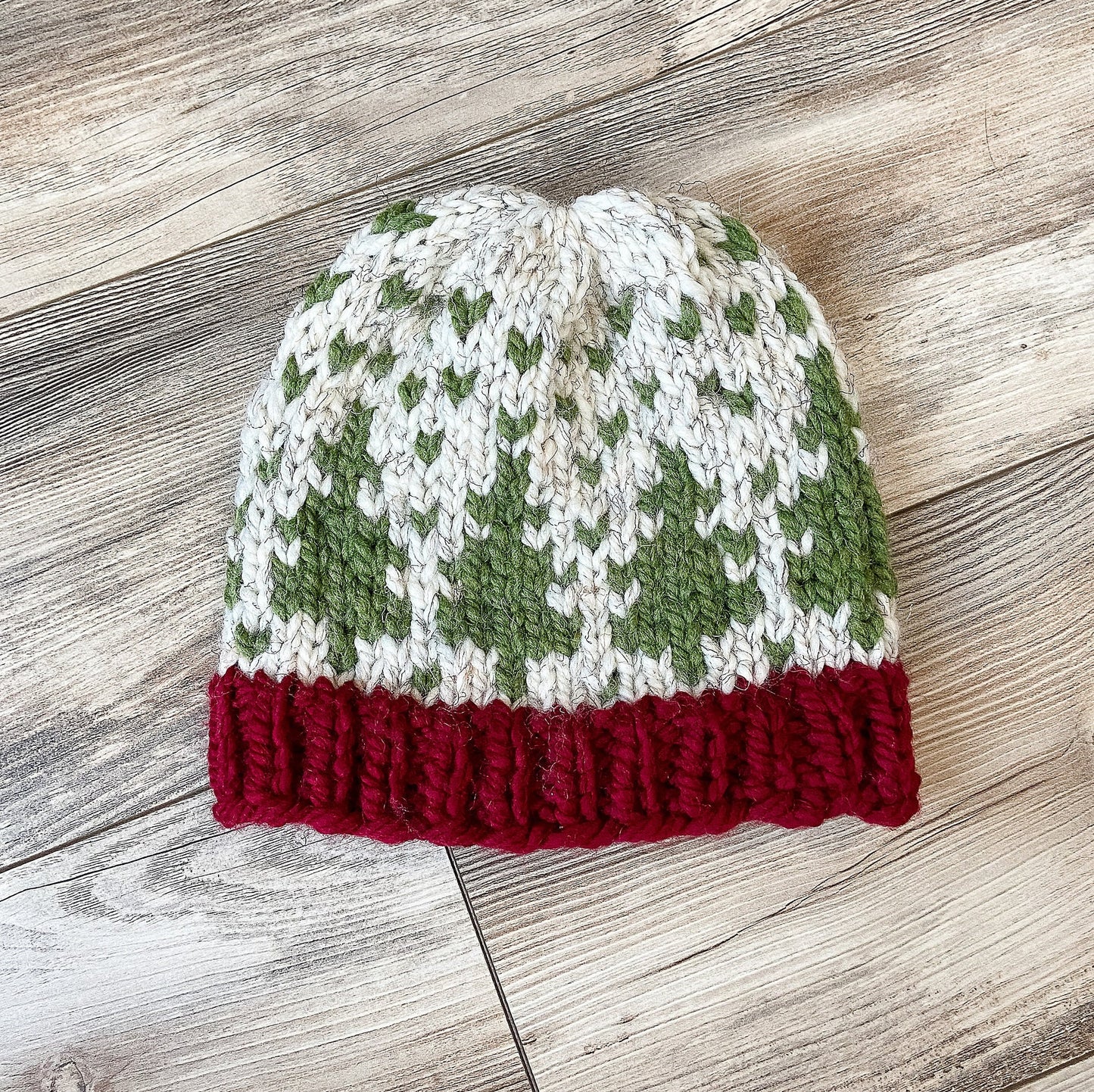Christmas hat knit in a beautiful fair isle pine trees pattern