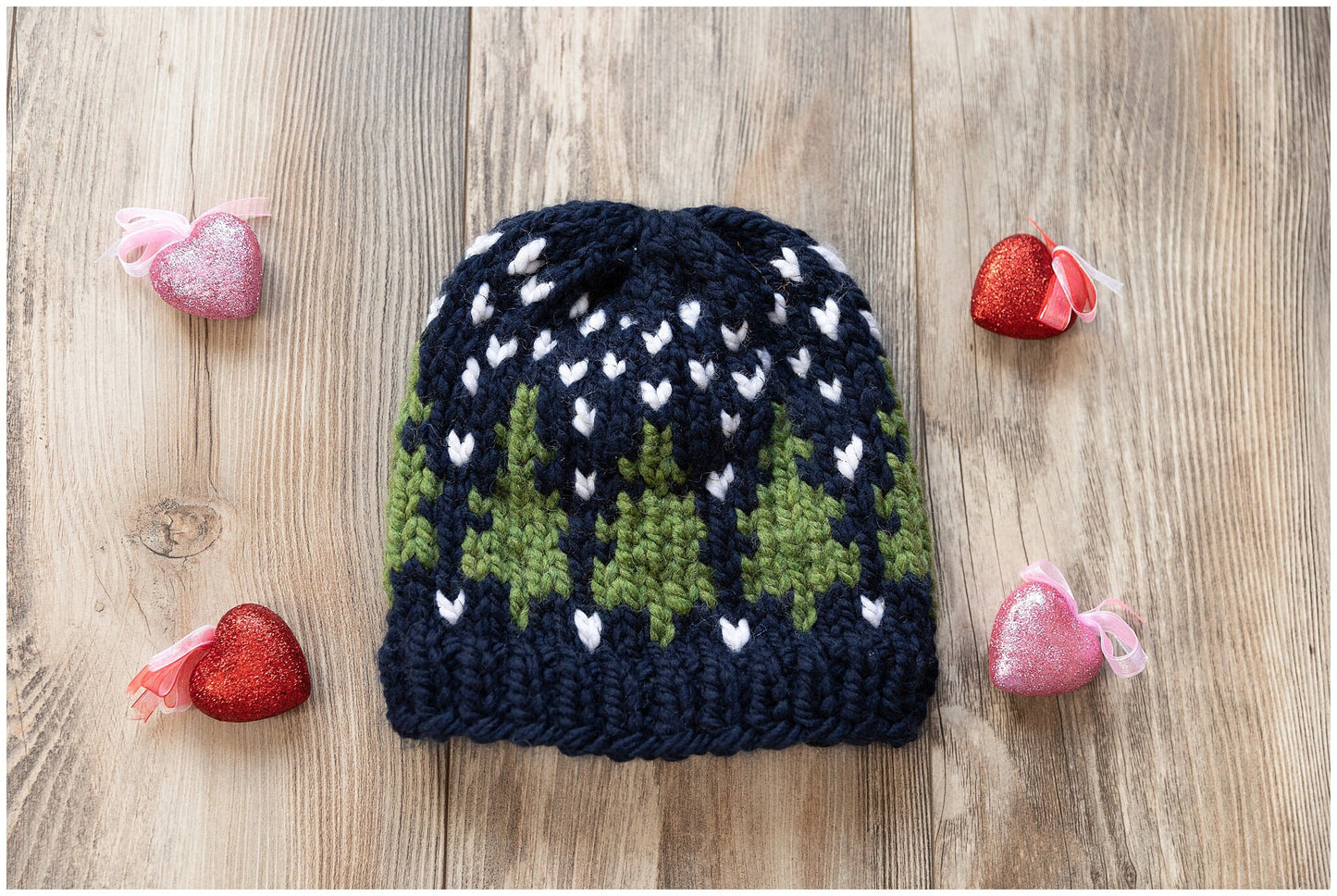 Christmas hat knit in a beautiful fair isle pine trees pattern
