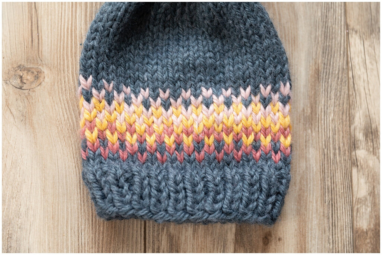 Fair Isle rainbow/sunrise slouchy hat made with recycled yarn