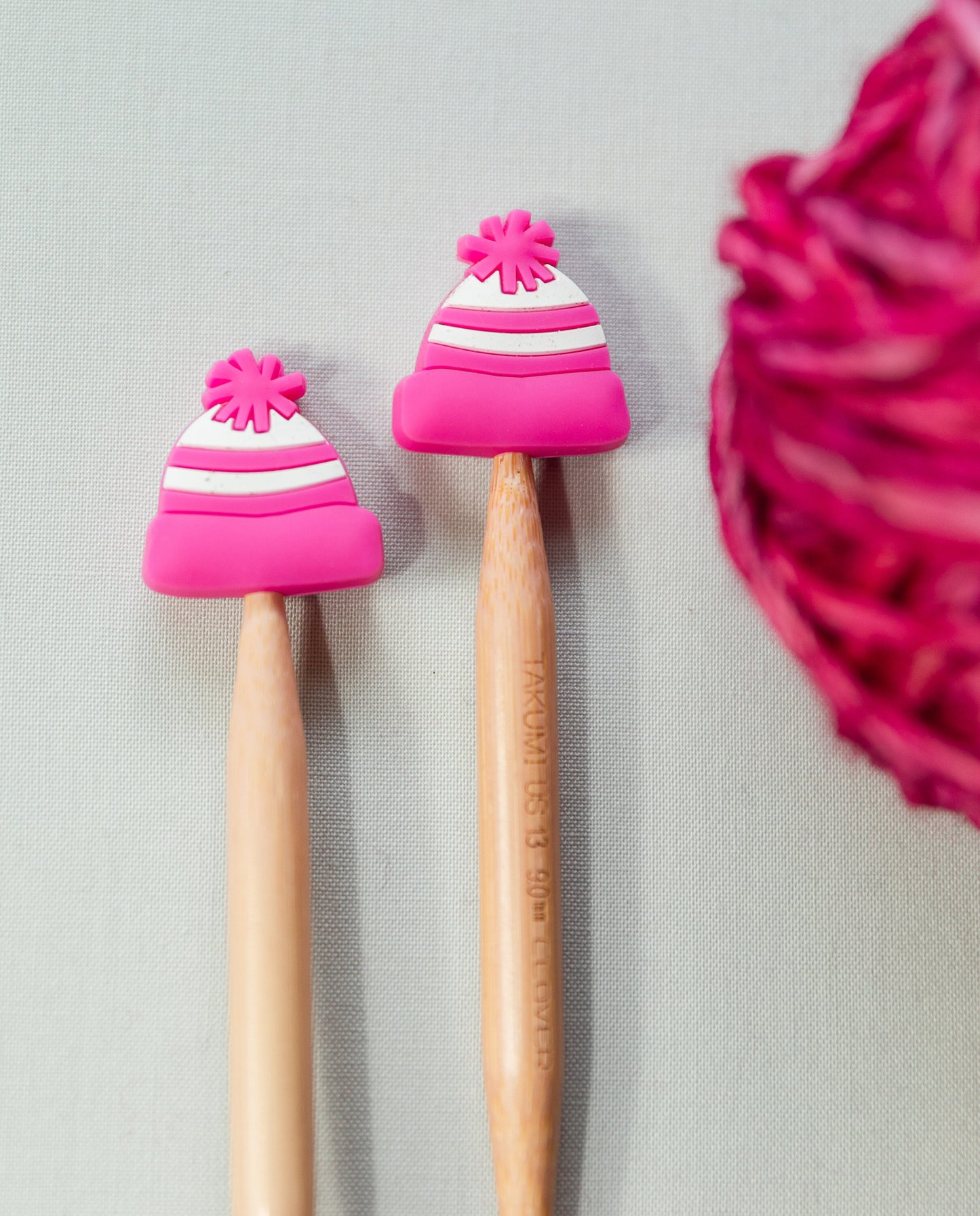 Winter stitch stoppers | Knitting notions bright pink beanie | pink winter hat stitch stopper