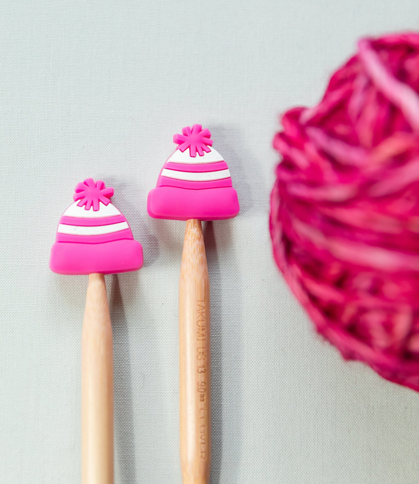 Winter stitch stoppers | Knitting notions bright pink beanie | pink winter hat stitch stopper