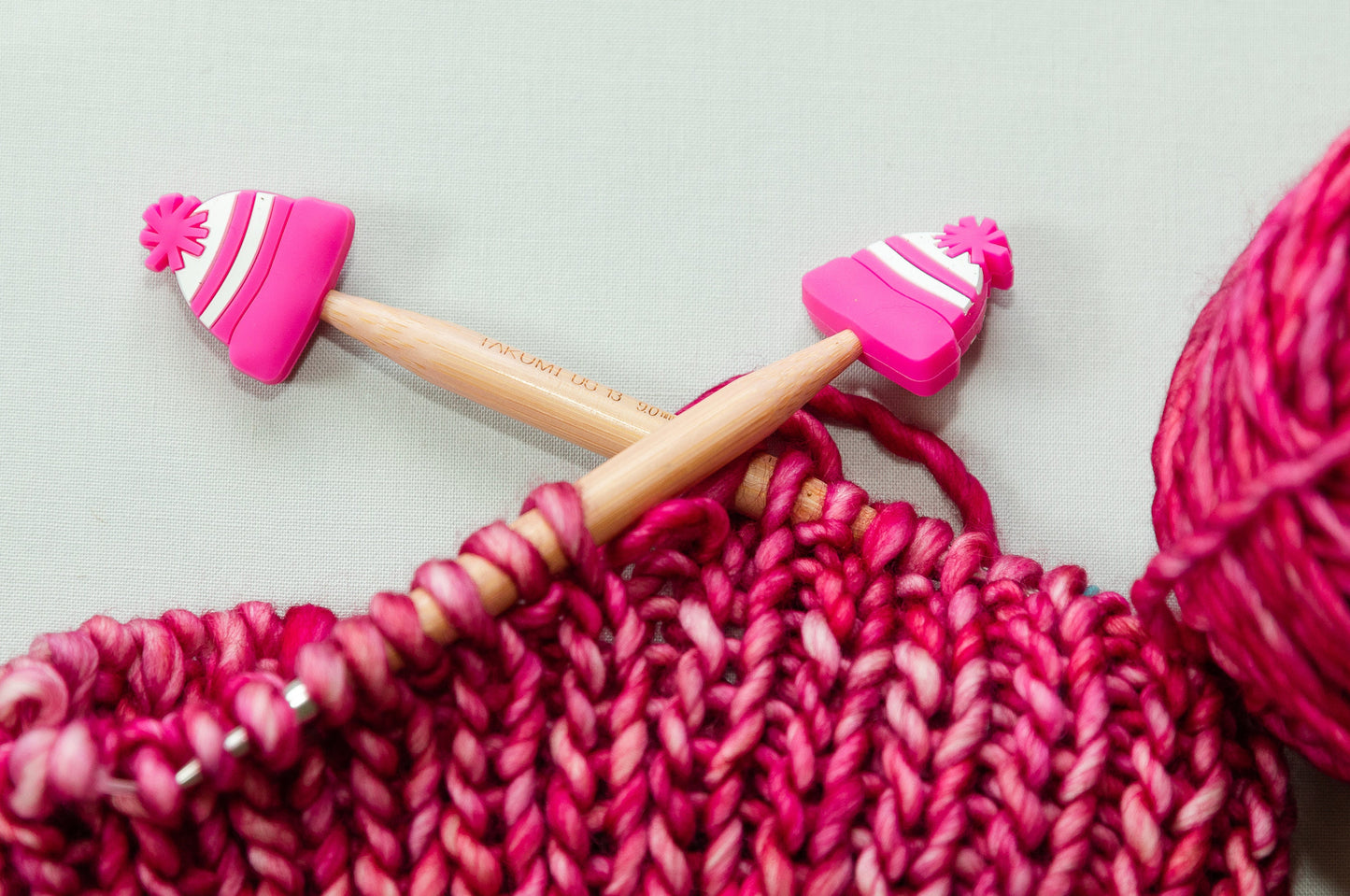 Winter stitch stoppers | Knitting notions bright pink beanie | pink winter hat stitch stopper