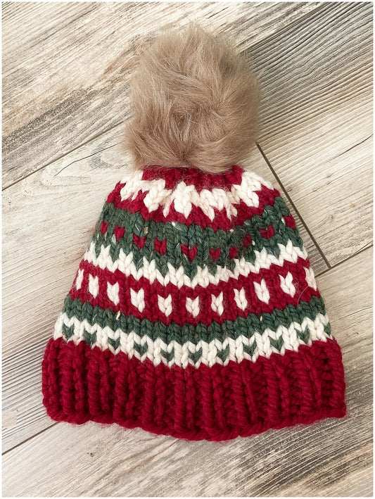 Women's Christmas hat knit in classic fair isle pattern with faux fur pom-pom