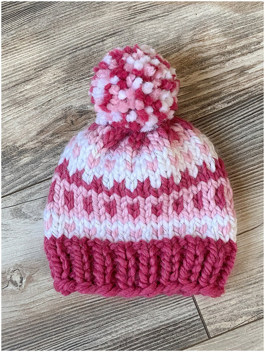 Toddler Girl Fair Isle pink hat in two shades of pink and sparkly white yarn